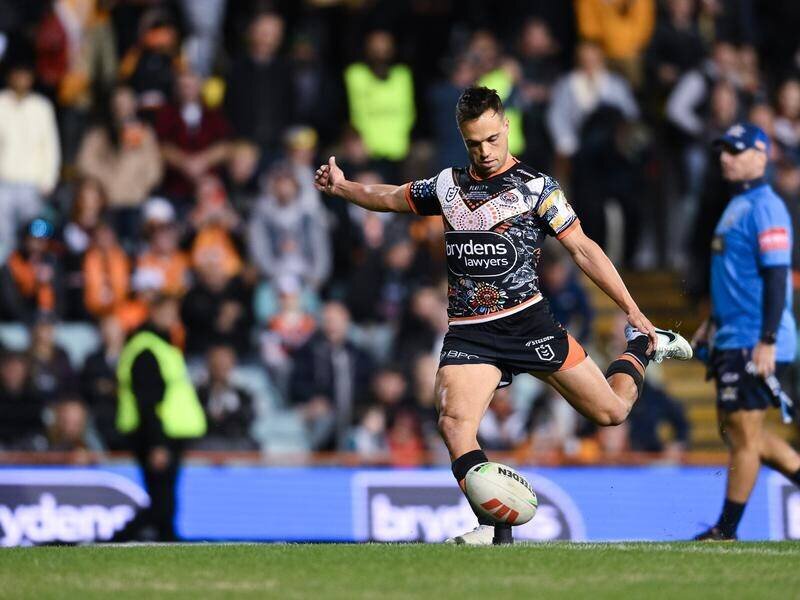 A player puts a stop to rumors about his NRL future by signing a four-year contract with the Manly Sea Eagles. 7